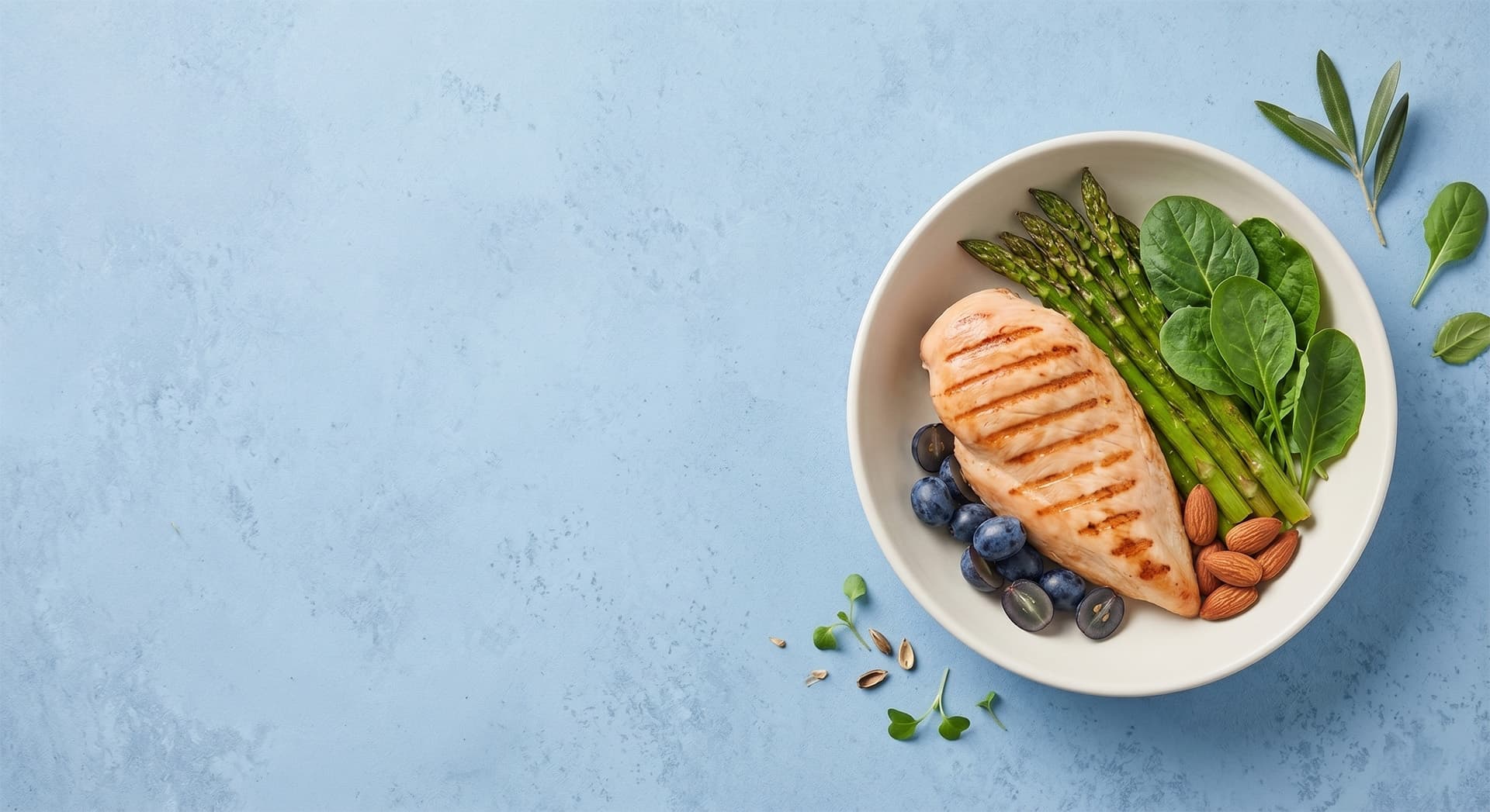 Salmon fillet with green vegetables on a light plate